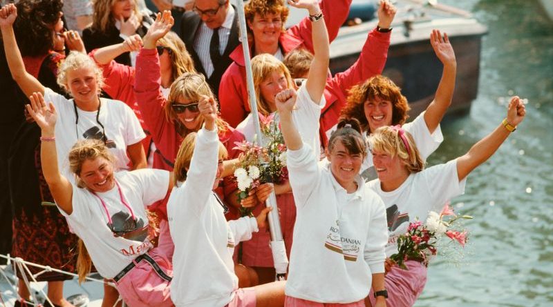 Young women on the Maiden yacht adventure, navigating the ocean together.