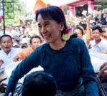 Professionals discussing democracy and human rights related to Aung San Suu Kyi.