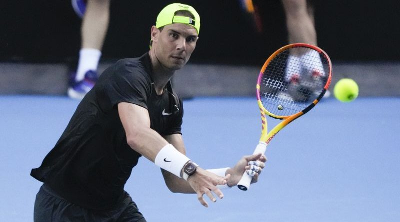 Tennis players competing in the Australian Open, focusing on Nadal and Draper.