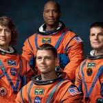 Four astronauts in training for the Artemis II moon mission, showcasing teamwork and preparation.