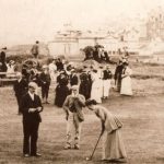 Women practicing golf swings at the oldest women's golf club.