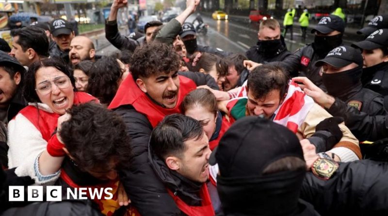 A crowd of workers at a May Day protest advocating for labor rights in Turkey.