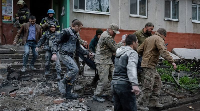 Military personnel discussing Russia's outdated military equipment in a command center.