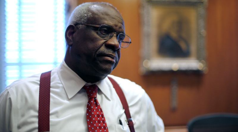 Senate Democrats discussing Justice Clarence Thomas ethics allegations in a formal setting.