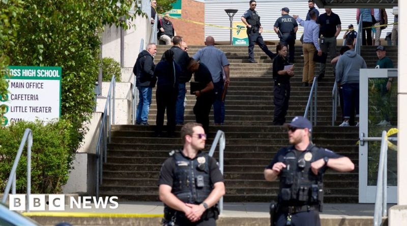 Students and emergency responders in a school stabbing incident scene.