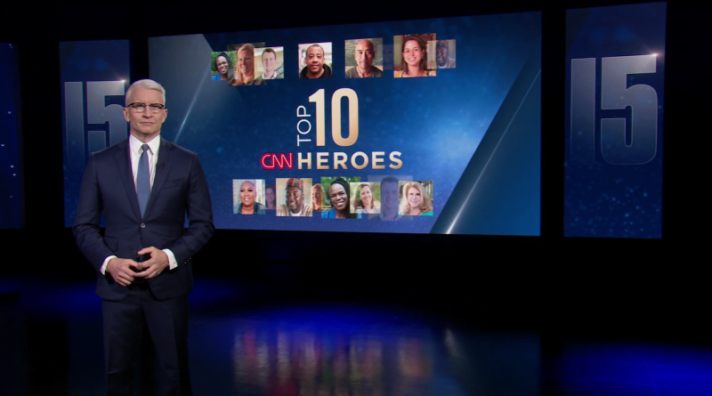 A group discussing how to donate to CNN Heroes in a professional setting.