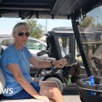 Elderly residents demonstrate in a retirement community during Trump's visit.