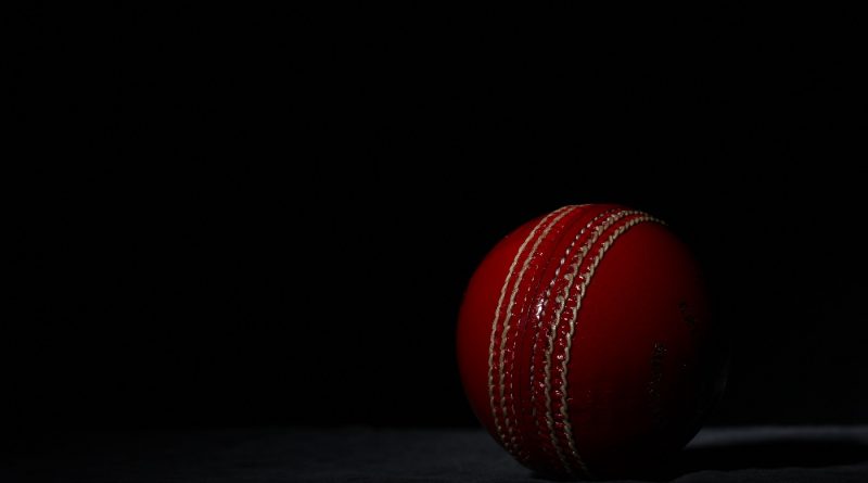 Young professionals in conservative attire discussing cricketers arrested filming women.