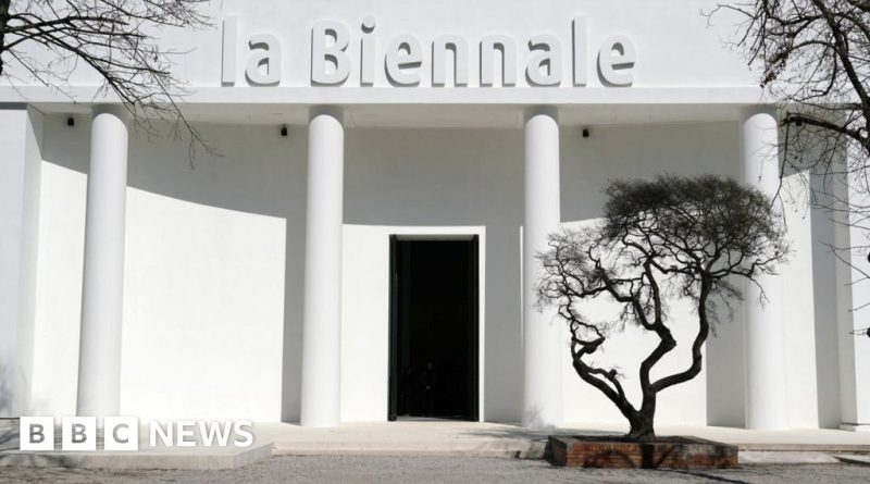 Professionals discussing at the Venice Biennale amid jury resignation news.